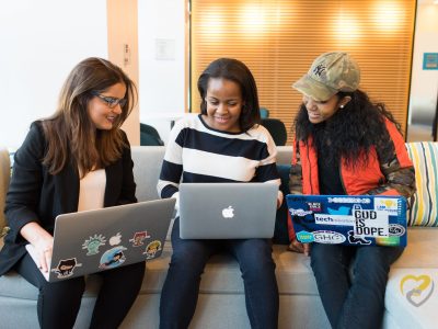three-woman-in-front-of-laptop-computer-1181233